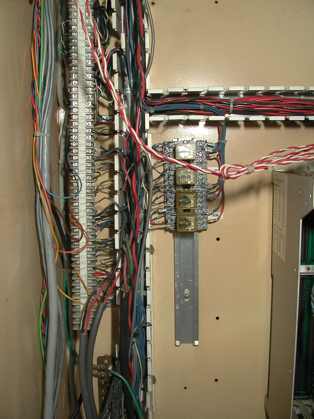 Mid-Way Down Left-Side Terminal Bus/Relays